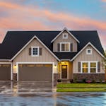 Charming family home in Boise, ID with a modern facade and spacious garage.